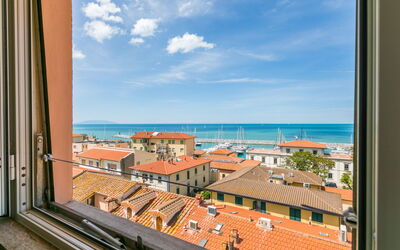 San Vincenzo 240: Sky, Cloud, Water, Property, Building, Window, Azure, Wood, Horizon, Real Estate