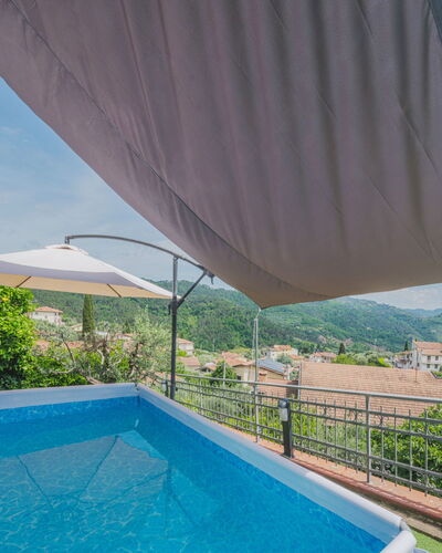Casa Lorena: Water, Sky, Plant, Daytime, Property, Green, Azure, Building, Swimming Pool, Shade