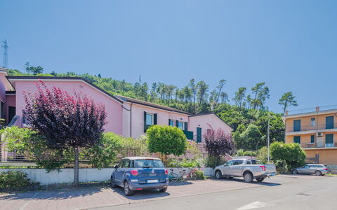 Caddy: Car, Sky, Plant, Building, Property, Wheel, Vehicle, Window, Road Surface