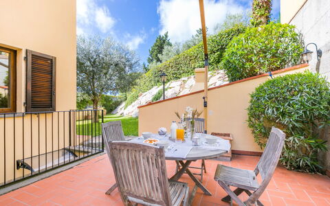 Valentina: Table, Cloud, Plant, Sky, Property, Furniture, Flowerpot, Building, Chair, Outdoor Furniture