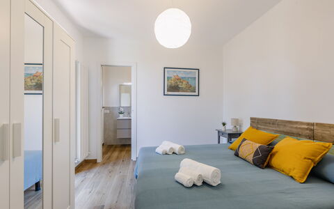 Il Pino Apartment: Furniture, Bed, Interior Design, Floor, Flooring, Bedroom, Wall, Bedding, Bed Sheet, Wood