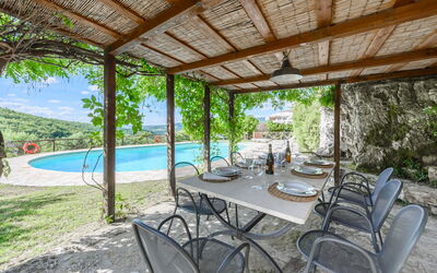 Villa Poggio La Croce: Furniture, Outdoor Furniture, Chair, Swimming Pool, Outdoor Table, Resort, Flagstone, Eco Hotel, Shade, Kitchen & Dining Room Table