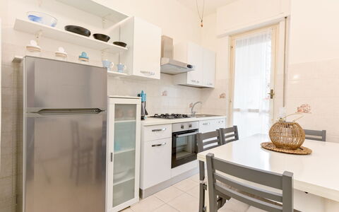 Al Numero 13: Furniture, Interior Design, Flooring, Floor, Wood, Ceiling, Major Appliance, Kitchen Appliance, Room, Apartment