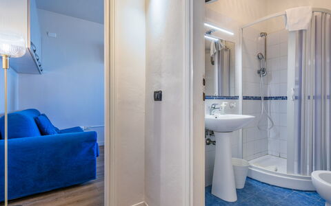 Mediterraneo: Flooring, Floor, Interior Design, Room, Apartment, Ceiling, Plumbing Fixture, Bathroom, Bed, Hotel