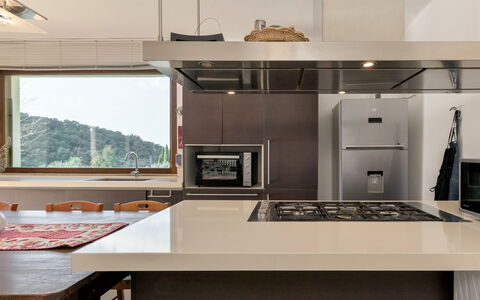 Augusta: Kitchen, Countertop, Kitchen Appliance, Interior Design, Furniture, Ceiling, Wood, Flooring, Cabinetry, Light Fixture