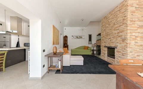 Augusta: Furniture, Flooring, Interior Design, Floor, Wall, Wood, Ceiling, Room, Lighting, Living Room