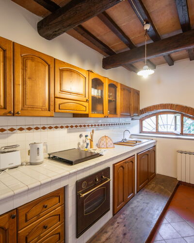 Antico Loggiato: Kitchen, Countertop, Wood, Flooring, Interior Design, Cabinetry, Kitchen Sink, Ceiling, Kitchen Appliance, Floor