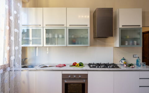 Casamia Tuscan Oasis: Architect-Designed 4Br Penth: Kitchen, Kitchen Appliance, Major Appliance, Countertop, Cabinetry, Interior Design, Wood, Furniture, Home Appliance, Flooring