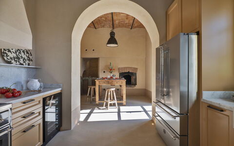 Villa del Mangia - Luxury Villa with Infinity Pool: Furniture, Interior Design, Flooring, Wall, Wood, Floor, Kitchen, Ceiling, Countertop, Lighting