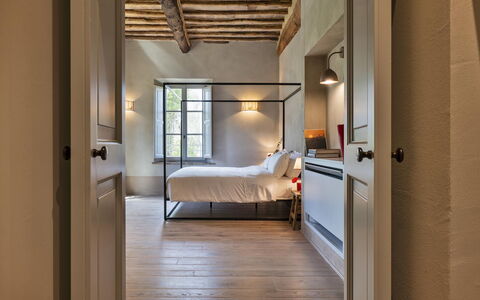 Villa del Mangia - Luxury Villa with Infinity Pool: Wall, Interior Design, Furniture, Flooring, Ceiling, Wood, Floor, Bedroom, Bed, Lighting