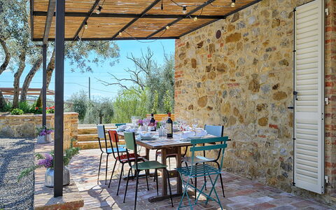Villa Marielena Chianti Farmhouse with Hot Tub: Furniture, Table, Outdoor Furniture, Kitchen & Dining Room Table, Chair, Outdoor Table, Patio, Shade, Dining Room, Restaurant