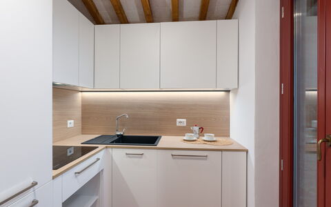Villa Marielena Chianti Farmhouse with Hot Tub: Wall, Kitchen, Wood, Interior Design, Countertop, Flooring, Kitchen Appliance, Cabinetry, Floor, Major Appliance