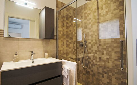 Via Nazionale: Bathroom, Flooring, Bathroom Sink, Floor, Interior Design, Plumbing Fixture, Wall, Sink, Bathroom Cabinet, Mirror