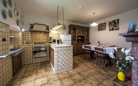 Casa Brezza del Gabberi: Interior Design, Furniture, Flooring, Ceiling, Kitchen, Floor, Countertop, Room, Kitchen & Dining Room Table, Cabinetry