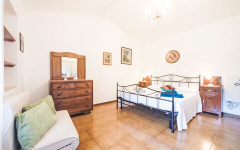 Casa Brezza del Gabberi: Furniture, Interior Design, Flooring, Floor, Bed, Ceiling, Bedroom, Apartment, Room, Lighting