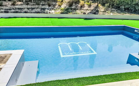 Umbriancevilla: Blue, Swimming Pool, Leisure, Composite Material, Water Feature, Landscaping, Shade, Resort, Design, Hotel