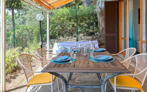 Sabrina: Furniture, Chair, Table, Outdoor Furniture, Kitchen & Dining Room Table, Outdoor Table, Restaurant, Shade, Eco Hotel, Dining Room