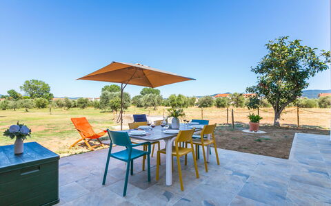 Castagneto Carducci 50: Cielo, Blu, Mobilia, Sedia, Mobili Da Esterno, Cucina & Sala Da Pranzo Tavolo, Tavolo Esterno, Shade, Landscaping, Giardino