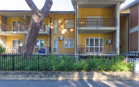 Casamare: Building, Wall, Residential Area, Facade, Neighbourhood, House, Home, Human Settlement, Apartment, Door