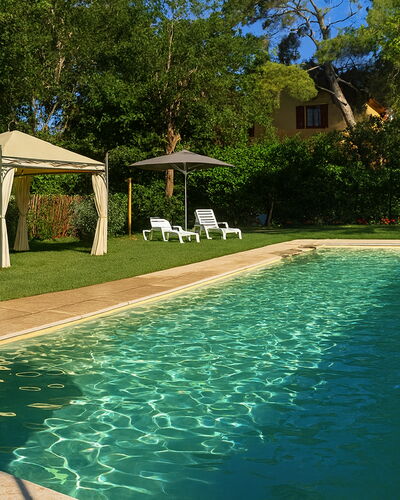 Appartamento Girasole Seaside and Pool: Swimming Pool, Resort, Shade, Backyard, Garden, Eco Hotel, Leisure, Landscaping, Hacienda, Water Feature
