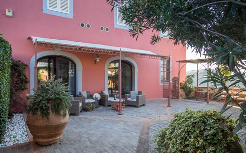 Villa Camelia: Wall, Architecture, Facade, Home, Flowerpot, Door, Hacienda, Houseplant, Balcony, Estate