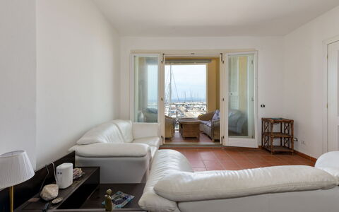 Al Porto: Furniture, Interior Design, Flooring, Floor, Couch, Ceiling, Room, Apartment, Living Room, Table