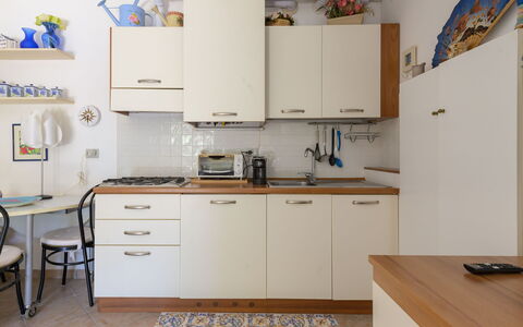 La Molletta: Kitchen Appliance, Kitchen, Major Appliance, Furniture, Countertop, Cabinetry, Flooring, Wood, Interior Design, Floor