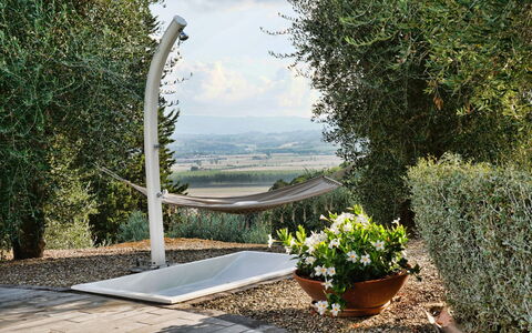 Villa Larino: Garden, Shade, Landscaping, Natural Material, Outdoor Furniture, Backyard, Flowerpot, Evergreen