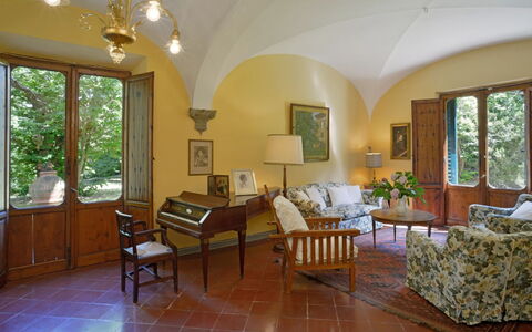 Villa Gioli: Furniture, Interior Design, Flooring, Chair, Table, Room, Ceiling, Floor, Lighting, Living Room