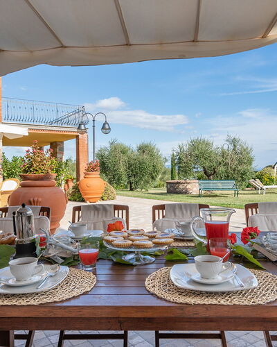 Villa Gabri 8: Furniture, Table, Outdoor Furniture, Chair, Kitchen & Dining Room Table, Outdoor Table, Umbrella, Food, Tablecloth, Swimming Pool