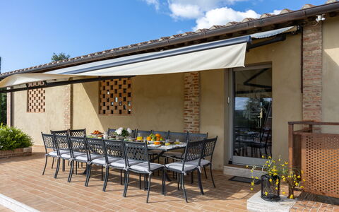 La Fonte di Santa Regina 8: Awning, Roof, Shade, Outdoor Structure, Patio, Kitchen & Dining Room Table, Outdoor Furniture, Chair, Porch, Outdoor Table