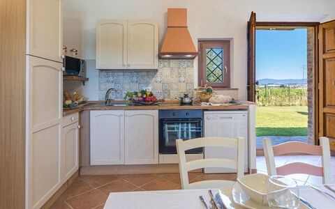 Il Grillo 10: Furniture, Interior Design, Kitchen, Kitchen Appliance, Flooring, Cabinetry, Countertop, Chair, Room, Kitchen & Dining Room Table
