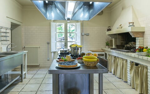 Villa la Corte 6: Kitchen, Kitchen Appliance, Countertop, Ceiling, Interior Design, Flooring, Furniture, Lighting, Major Appliance, Kitchen Stove
