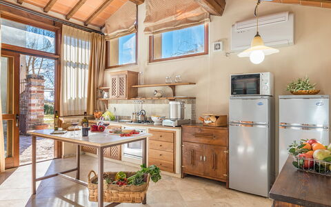 Villa le Chiarne 22: Kitchen, Wood, Furniture, Interior Design, Countertop, Flooring, Major Appliance, Home, Kitchen Appliance, Chair