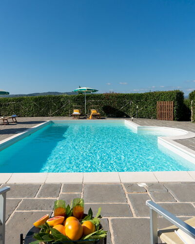 Villa Il Magnifico 10: Swimming Pool, Outdoor Furniture, Resort, Chair, Eco Hotel, Shade, Landscaping, Flowerpot, Outdoor Table, Houseplant