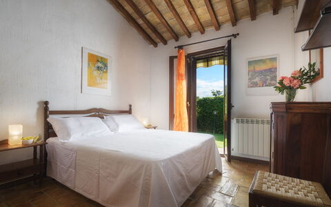 Podere Caprarecce 8: Wall, Furniture, Home, Bedroom, Bed, Bed Frame, Hardwood, Bedding, Houseplant, Wood Stain
