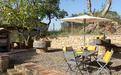 Casa la Fenice 8+2: Furniture, Outdoor Furniture, Chair, Garden, Backyard, Flagstone, Outdoor Table, Shade, Yard, Patio
