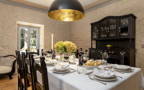 Villa la Rassinata 8: Furniture, Interior Design, Wall, Table, Dining Room, Chair, Kitchen & Dining Room Table, Wood, Light Fixture, Flooring