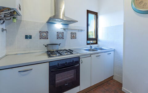 La Vigna 4: Kitchen, Major Appliance, Kitchen Appliance, Countertop, Kitchen Stove, Gas Stove, Kitchen Sink, Stove, Flooring, Cooktop