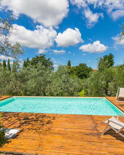 Villa Vittoria: Cloud, Plant, Sky, Property, Furniture, Water, Swimming Pool, Nature, Blue, Tree