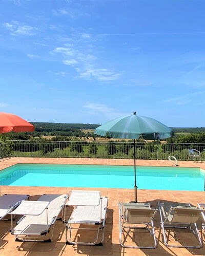 Podere la Quercia: Sky, Water, Property, Building, Furniture, Swimming Pool, Shade, Azure, Outdoor Furniture, Umbrella